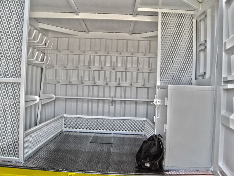 Workshop container interior fitted with rigging racks